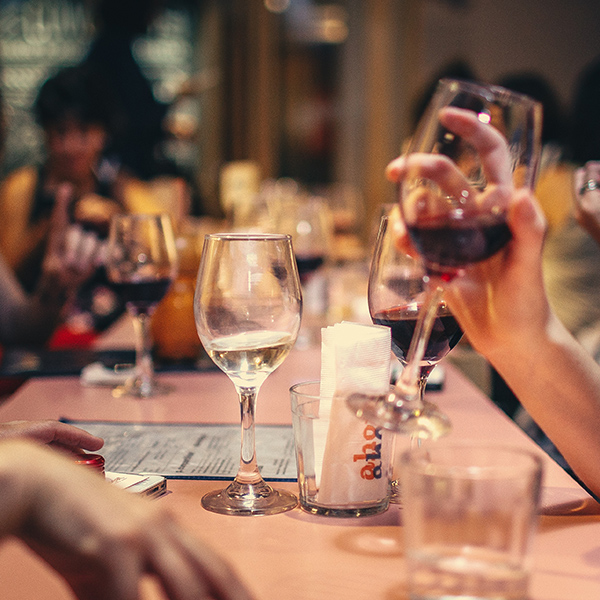 people drinking wine